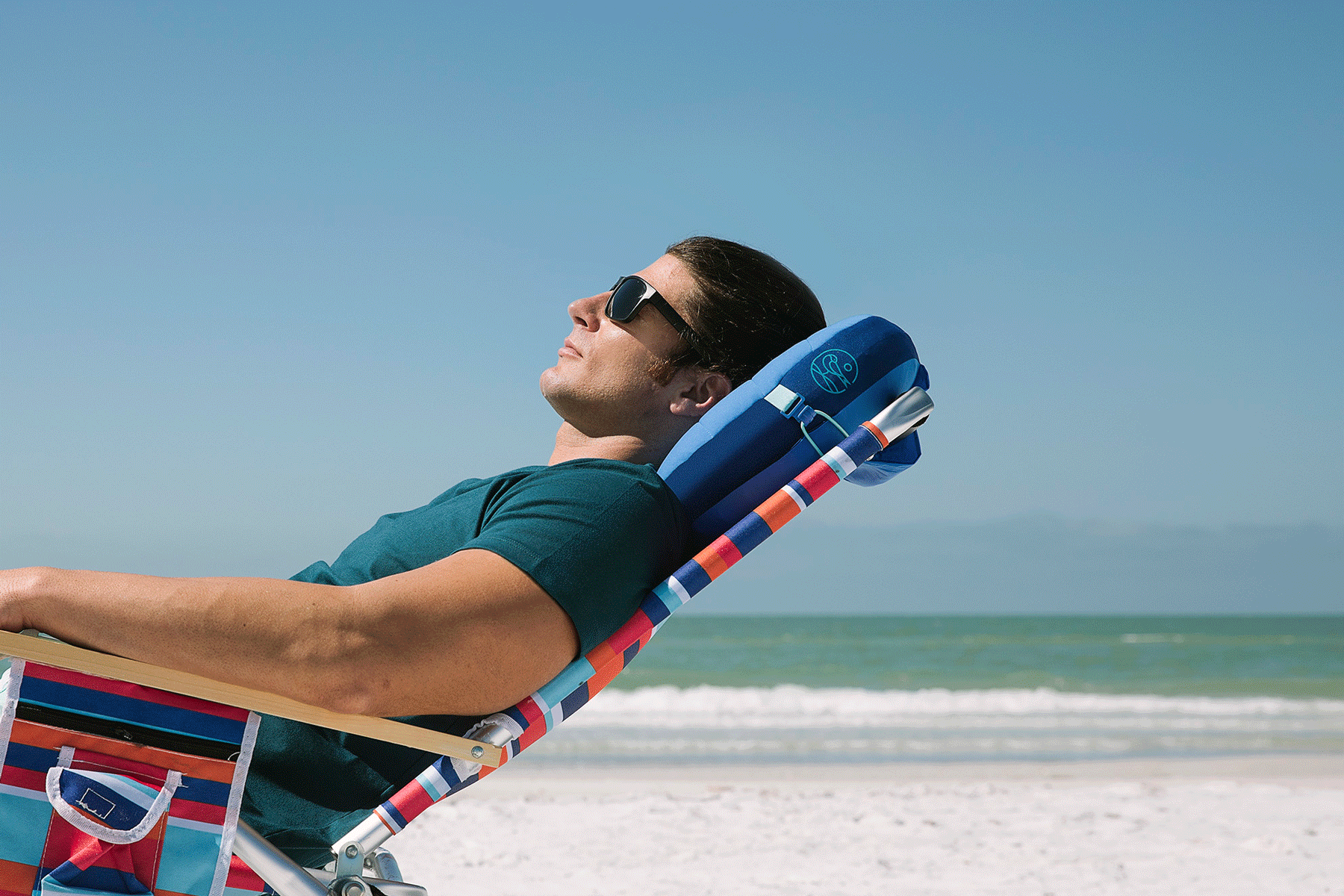 Ballast_beach-pillow-attaches-to-chairs.png__PID:c188e2d9-0413-4024-a14c-1a73f7c03364